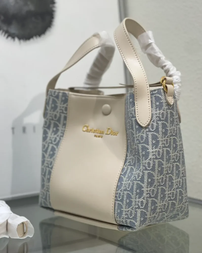 Cream and Blue Monogram Panel Tote — angled front view