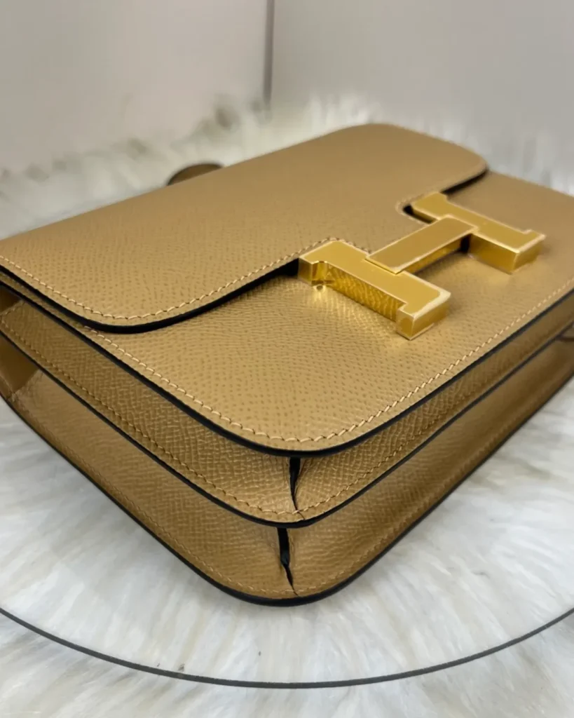 Kraft Tan constance-inspired mini 18 bag, base angle view