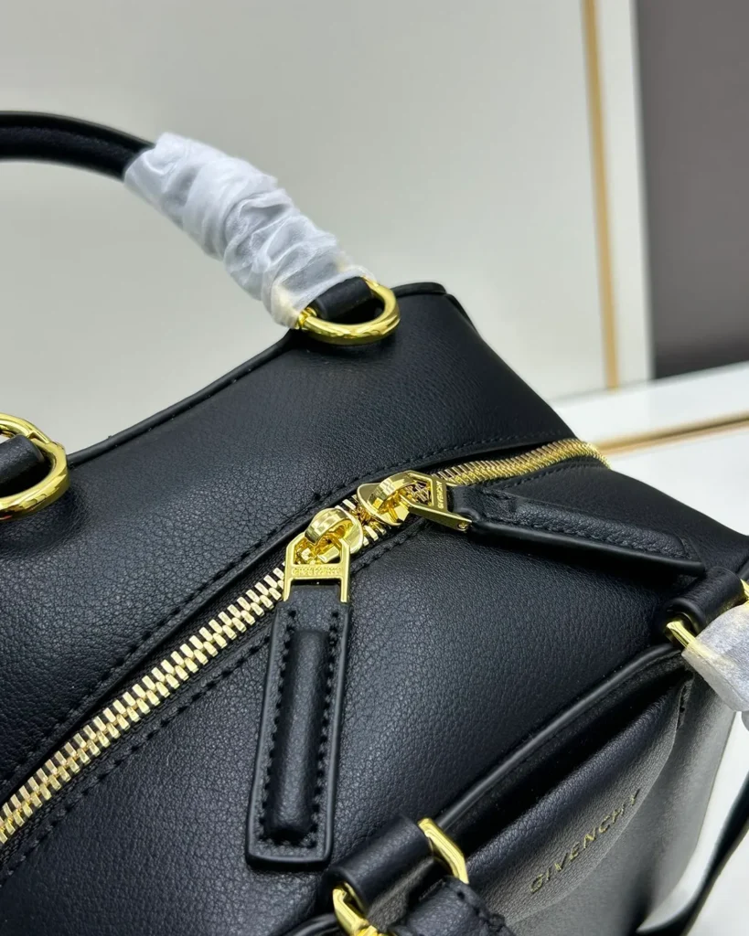 Black Domed Top Handle Bag — zip detail view