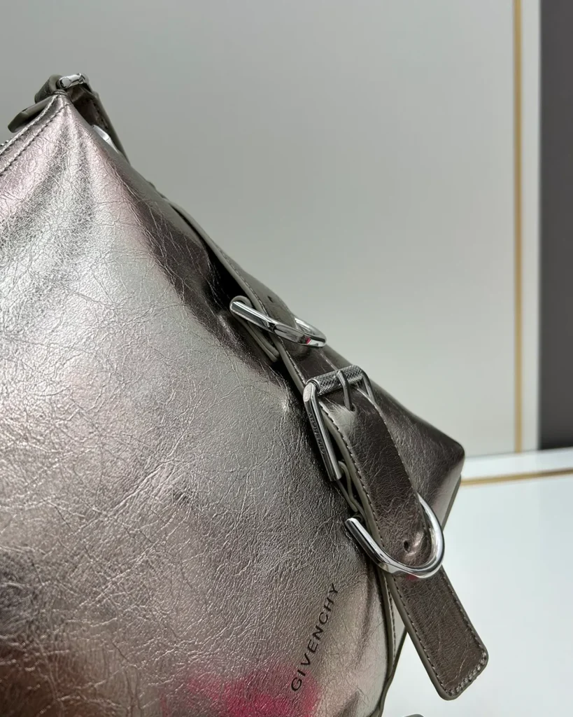 Metallic Silver Buckle Shoulder Bag — texture detail view