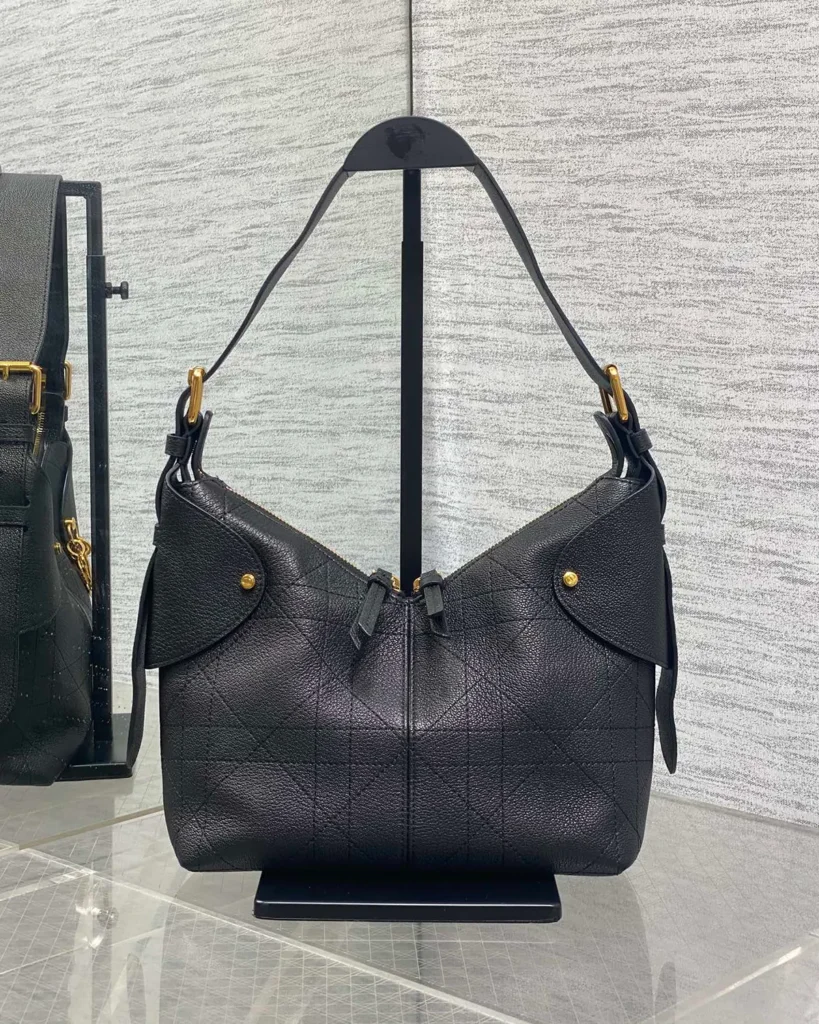 Black Soft Shoulder Bag with Letter Charms — angled front view