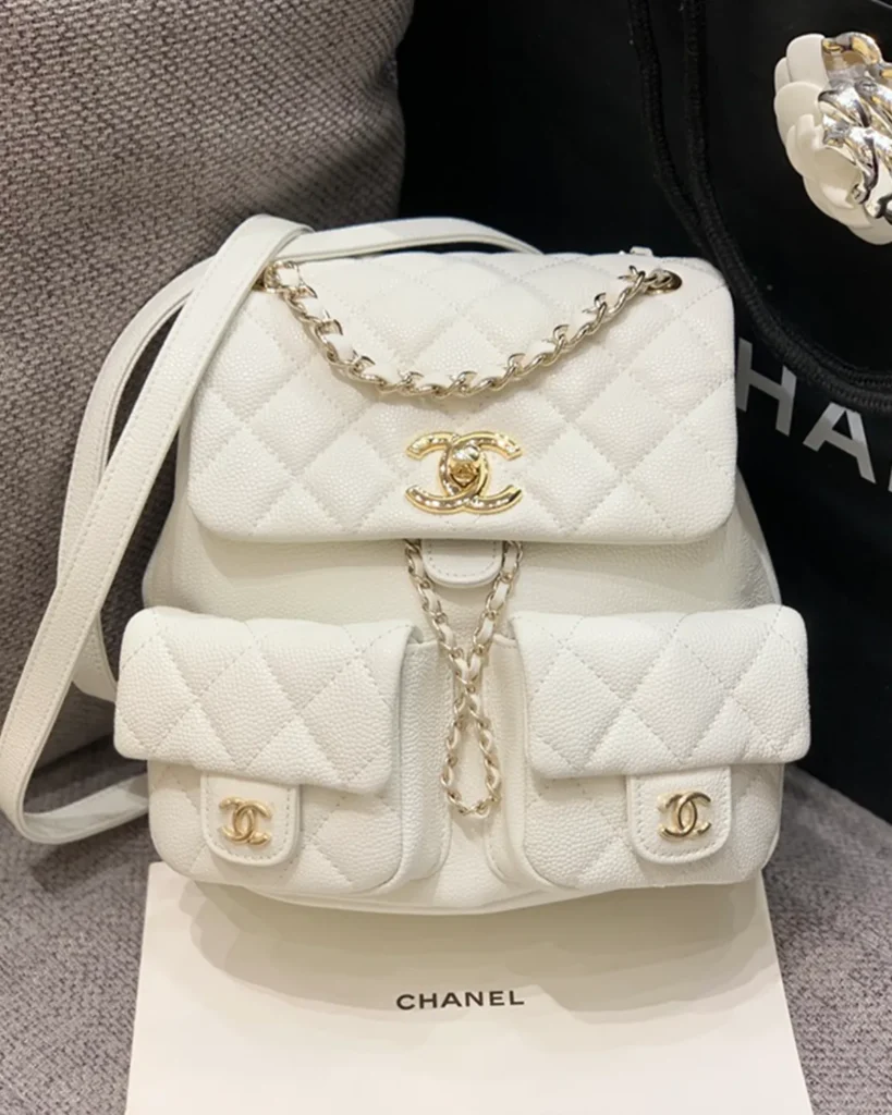 Ivory Quilted Twin-Pocket Backpack — front view