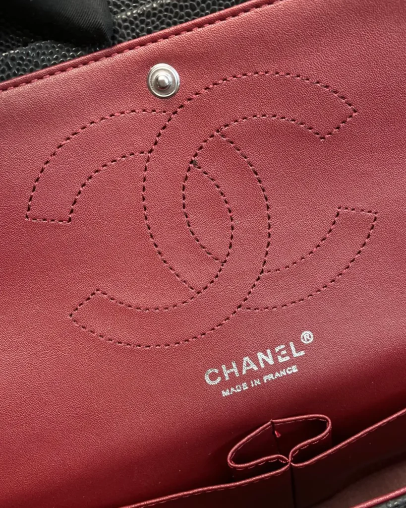 Black Quilted Silver-Tone Chain Flap Bag — interior label view