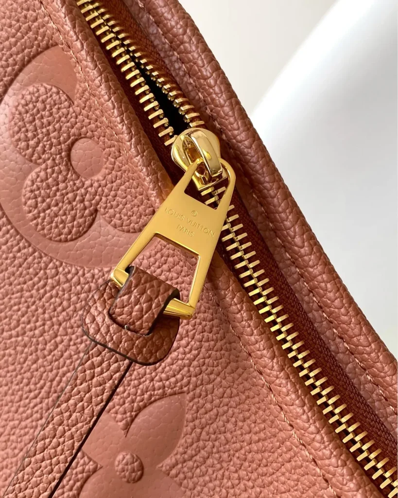 Cognac Embossed Monogram Shoulder Bag — zipper view
