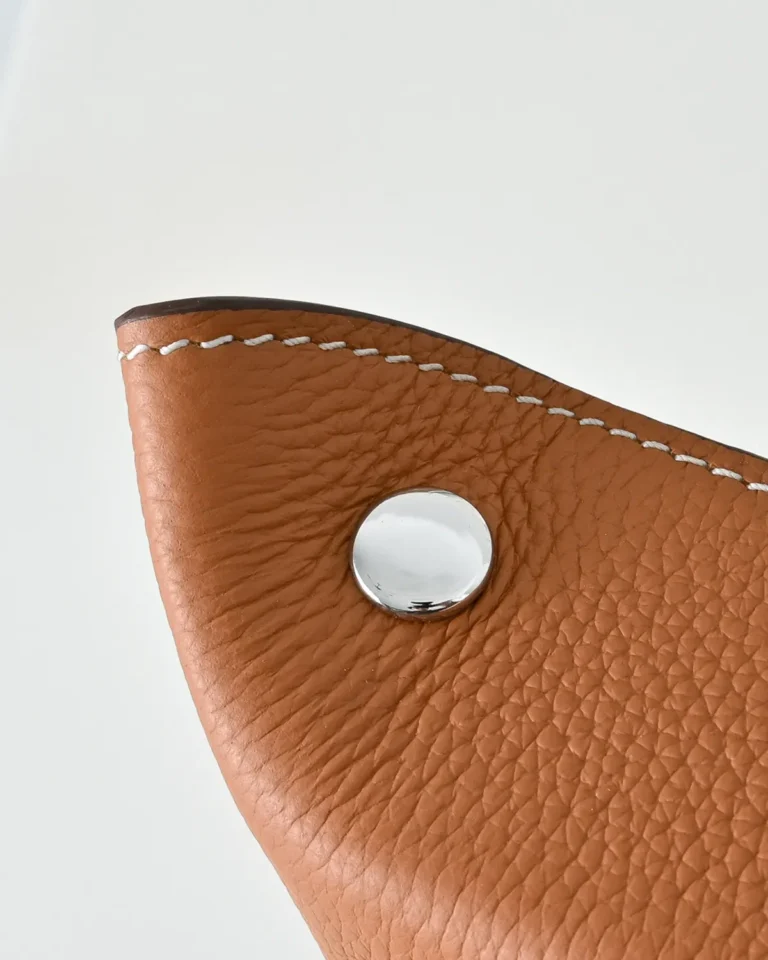 Videpoches-Inspired Tan Structured Crossbody Pouch, snap fastening close-up