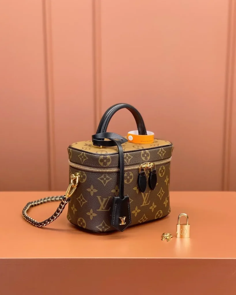 Two-Tone Monogram Vanity Bag with Chain — angled front view