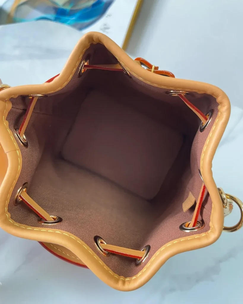 Brown Monogram Tan-Trim Drawstring Bucket Bag — interior view
