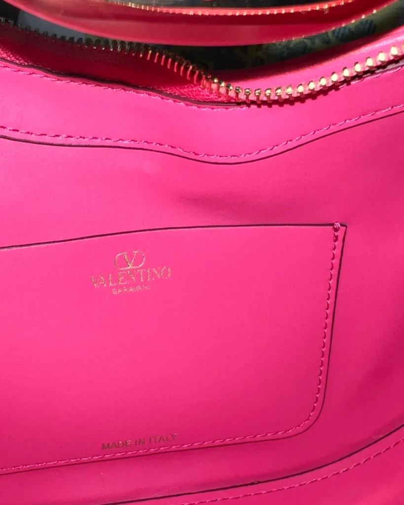 Bright Pink Crescent Chain Shoulder Bag — interior pocket view