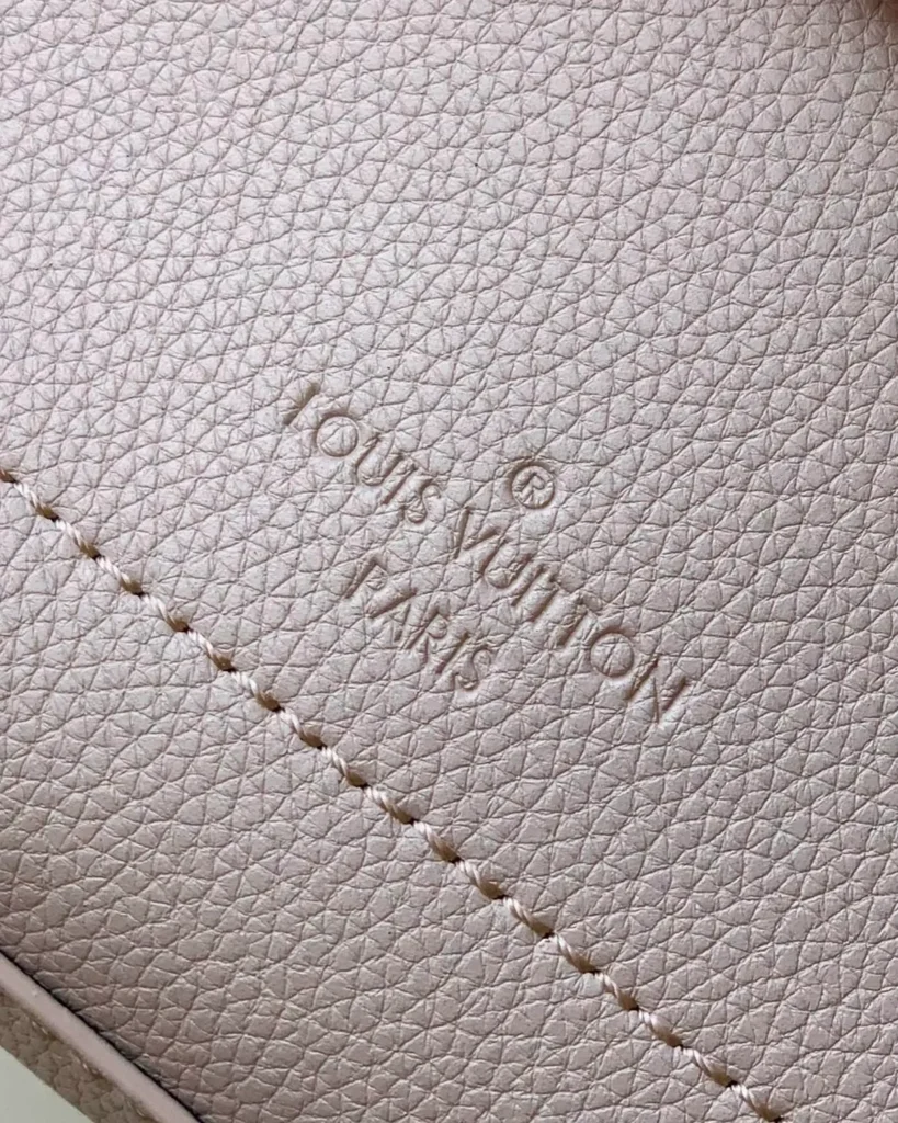 Greige Lockme Ever-Inspired Mini Handbag — interior lettering detail view