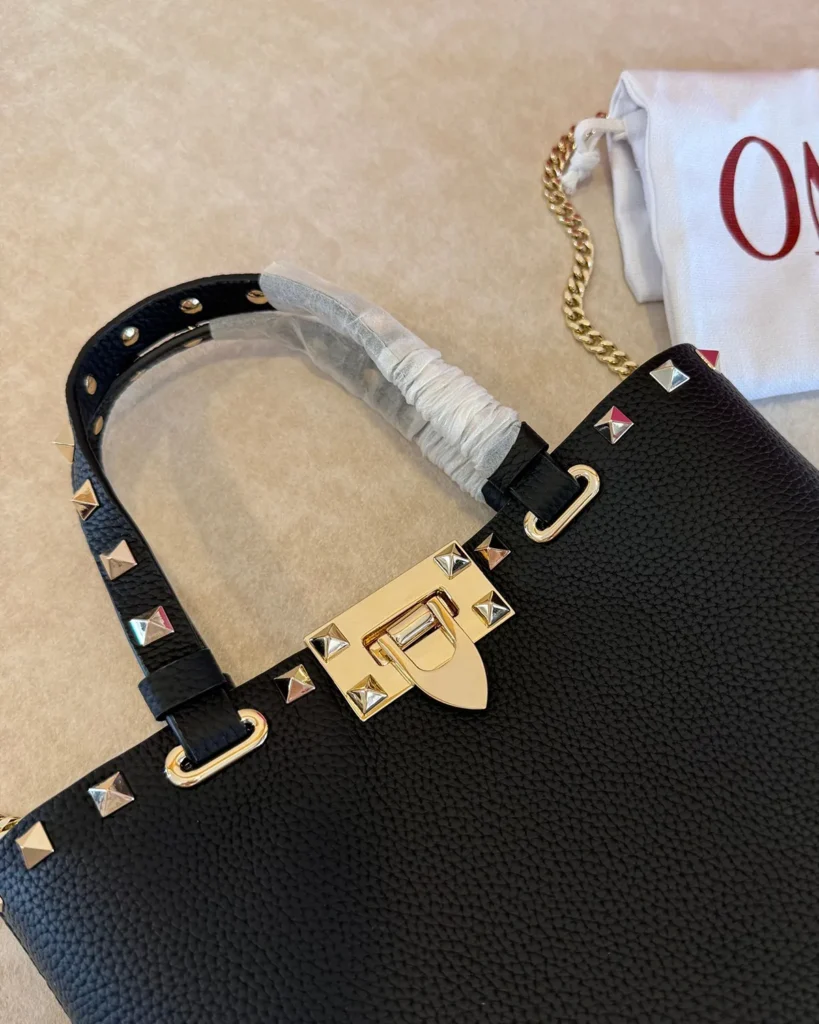 Black Studded Border Top-Handle Tote — closure detail view