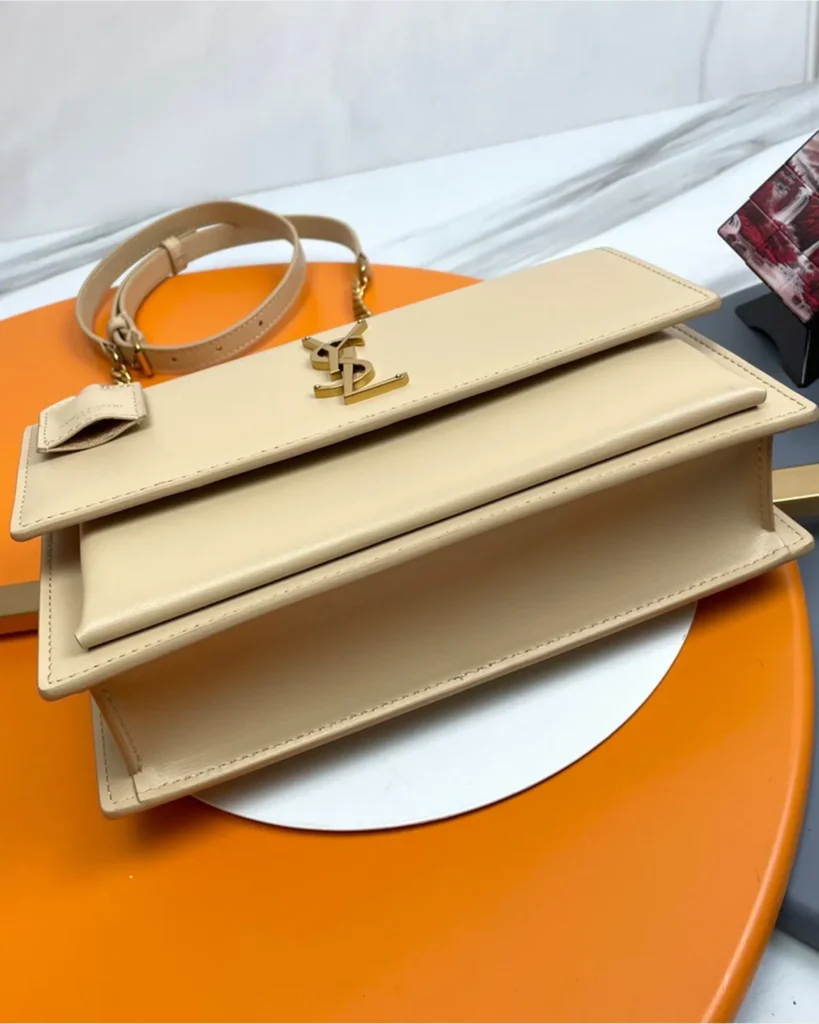 Cream Top-Handle Accordion Flap Bag — base view