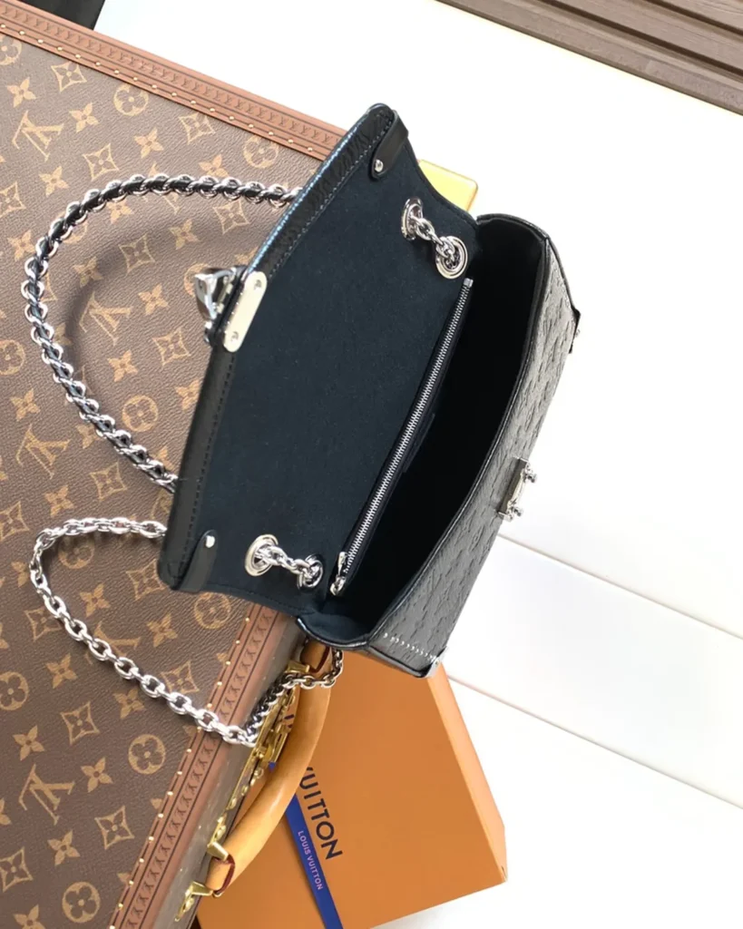 Black Embossed Chain Flap Bag — interior view