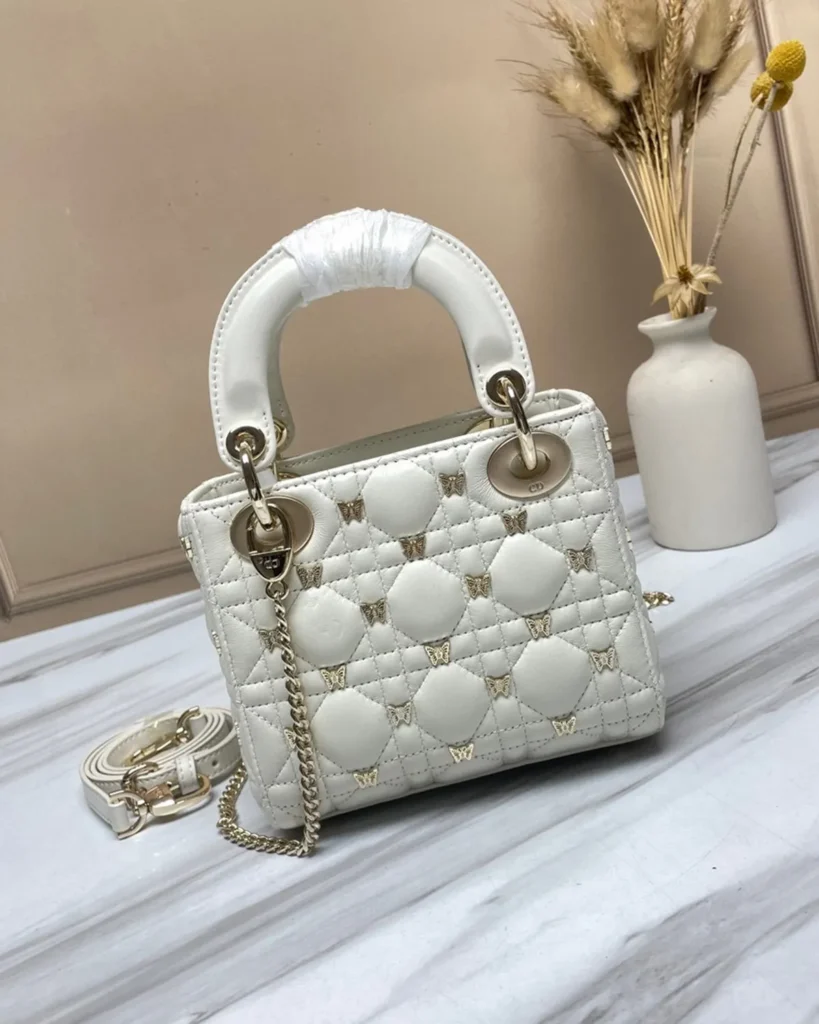 Ivory Butterfly Stud Quilted Top Handle Bag — rear view