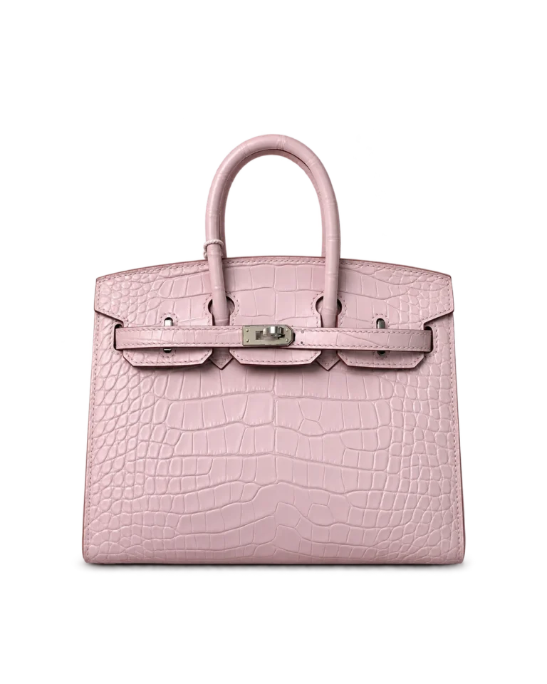 Upright front view of a pale mauve scale-texture top-handle bag with two handles and silver-tone turn-lock hardware
