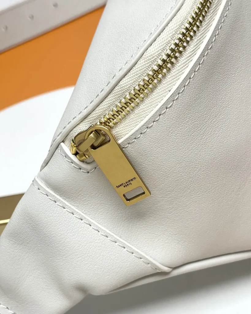 Cream Smooth-Look Zip Belt Bag — zipper detail view