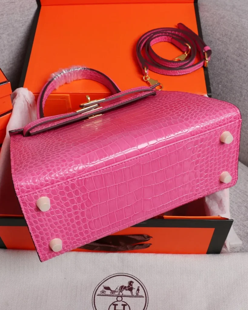 Kelly-Inspired Pink Croc-Pattern Top-Handle Bag, base and metal feet