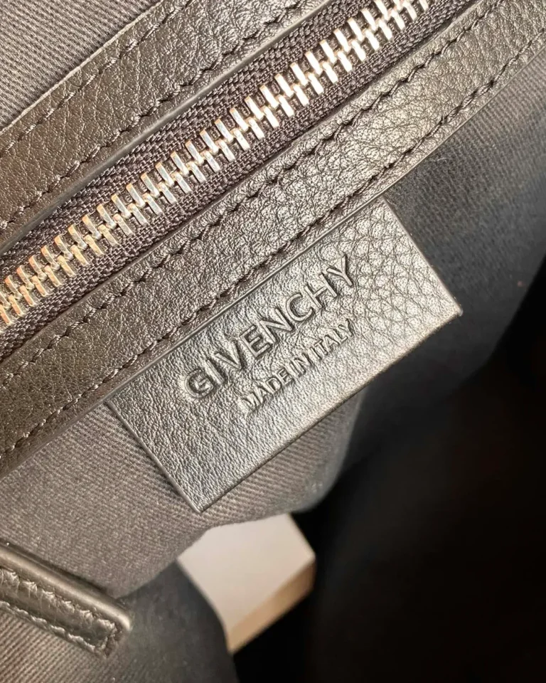 Black Rounded Twin-Handle Satchel — label detail