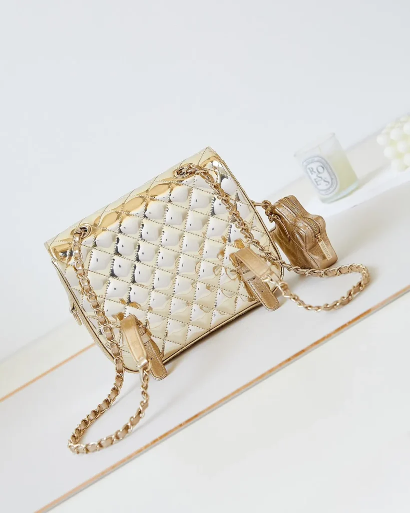 Metallic Gold Quilted Star-Charm Flap Bag — rear view