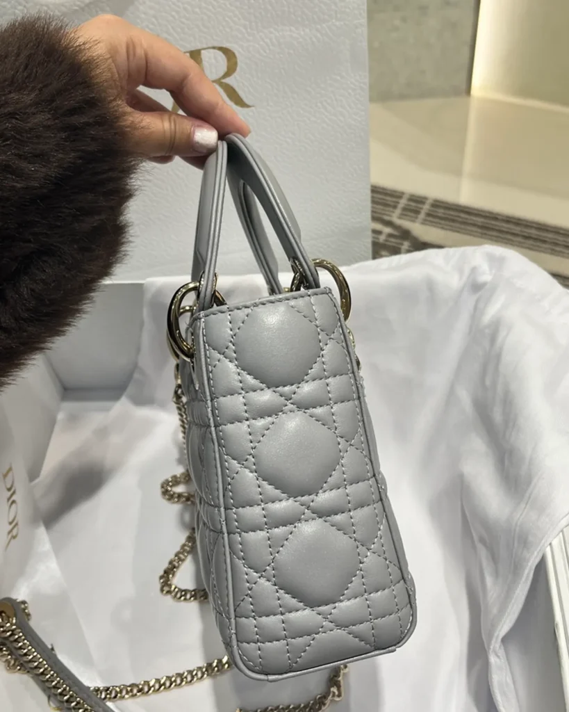 Pearlescent Gray Quilted Top Handle Bag — side view