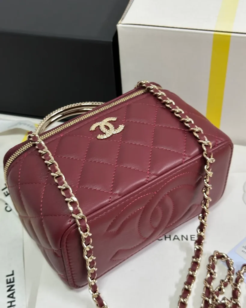 Burgundy Quilted Ornamental-Handle Vanity Bag — base view