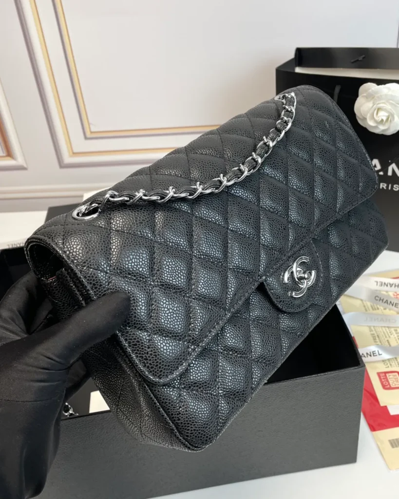 Black Quilted Silver-Tone Chain Flap Bag — angled front view