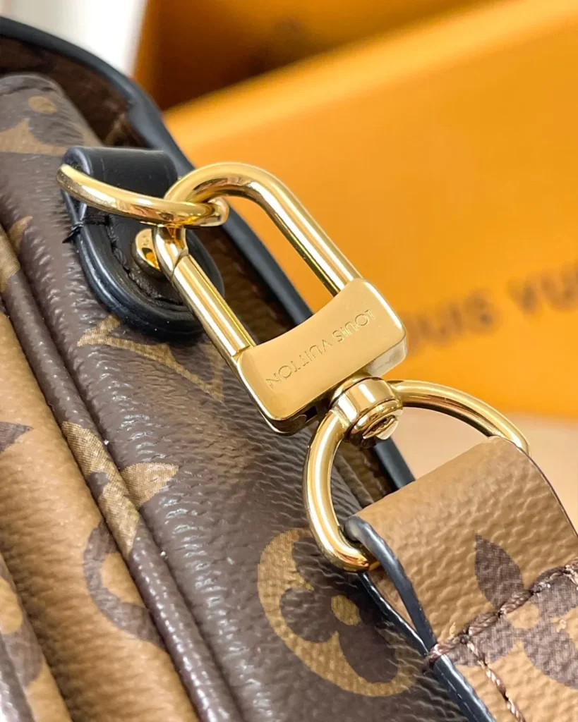 Two-Tone Monogram Envelope Satchel — strap clip view