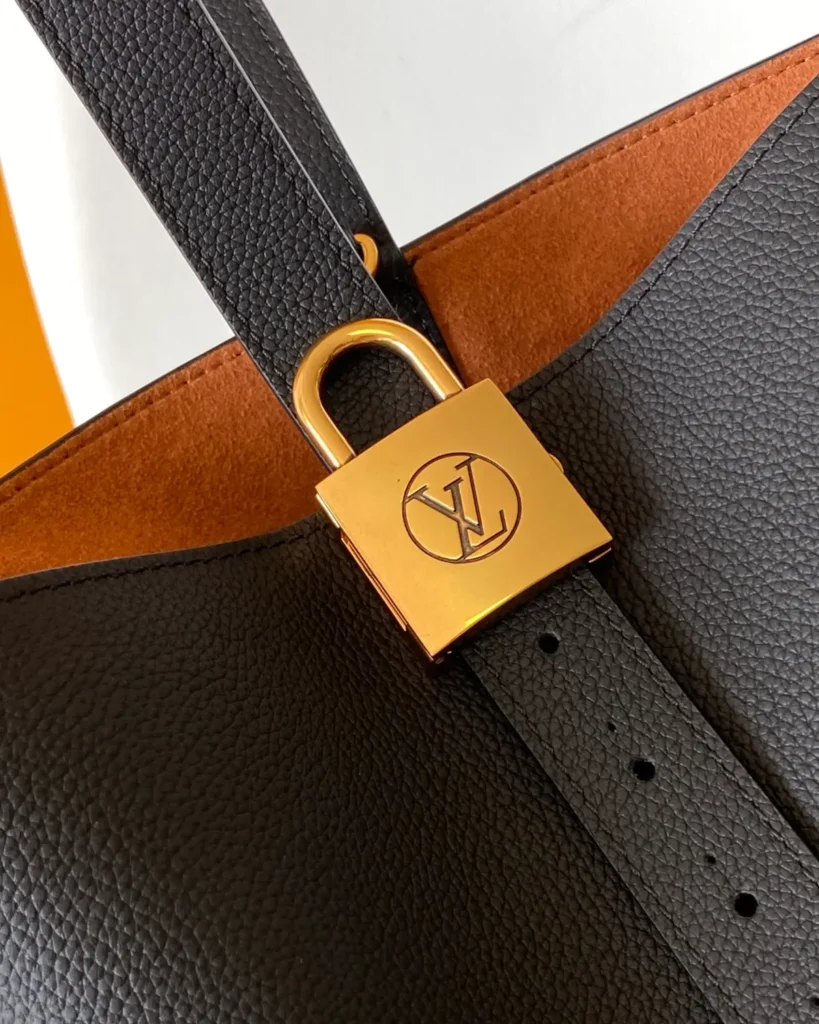 Black Curved Top Bucket Bag with Padlock — padlock view