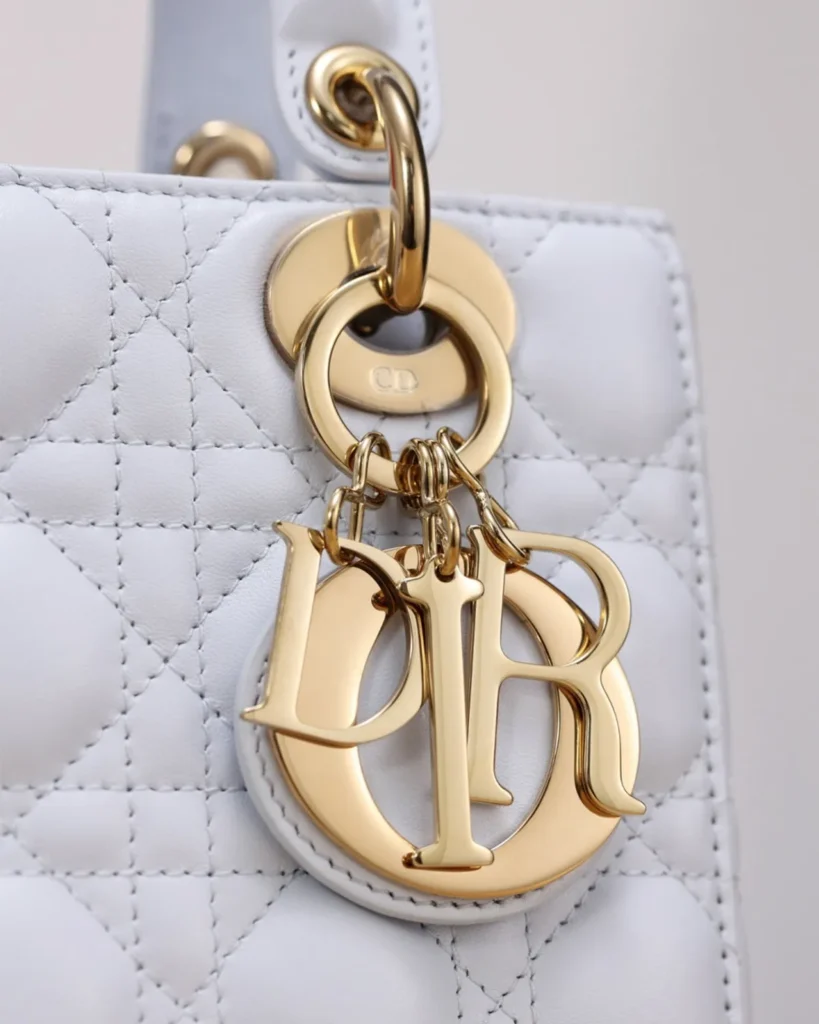 Pale Gray Quilted Top Handle Bag — charms view