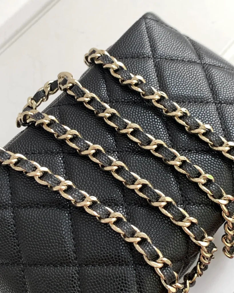 Black Quilted Short-Handle Shoulder Bag — chain detail view