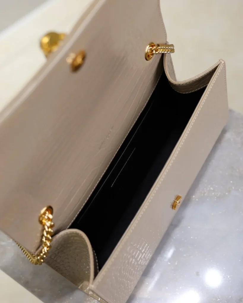 Taupe Embossed Tassel Chain Bag — interior view