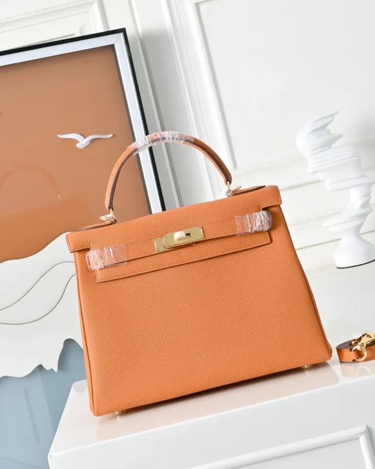 Kelly-Inspired 28 Orange Structured Top-Handle Bag, front display