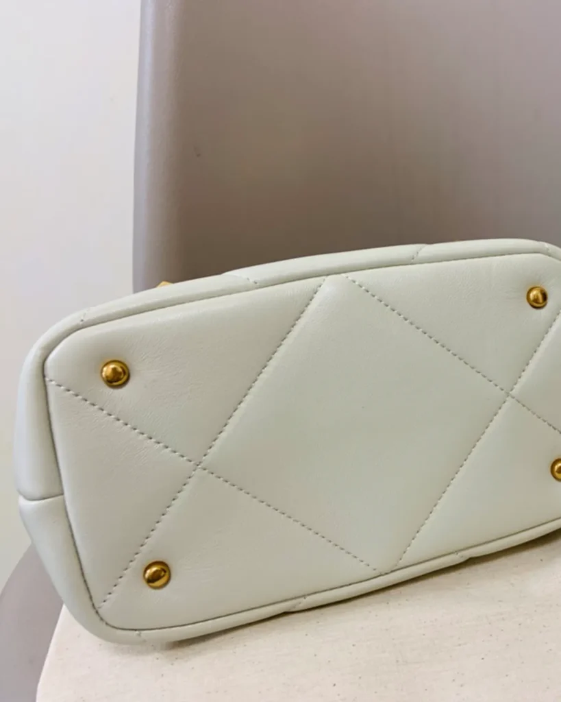 Ivory Diamond-Quilted Studded Top-Handle Bag — base view