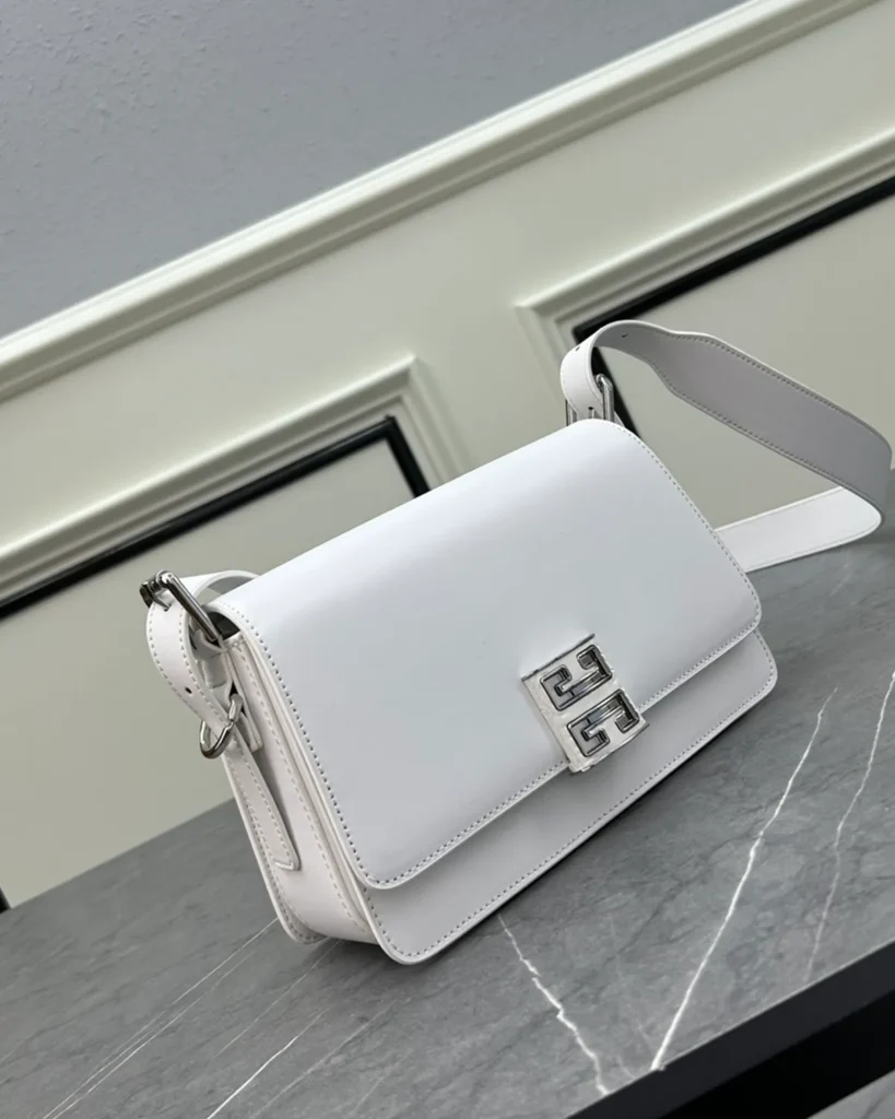 White Geometric Clasp Flap Bag — angled front