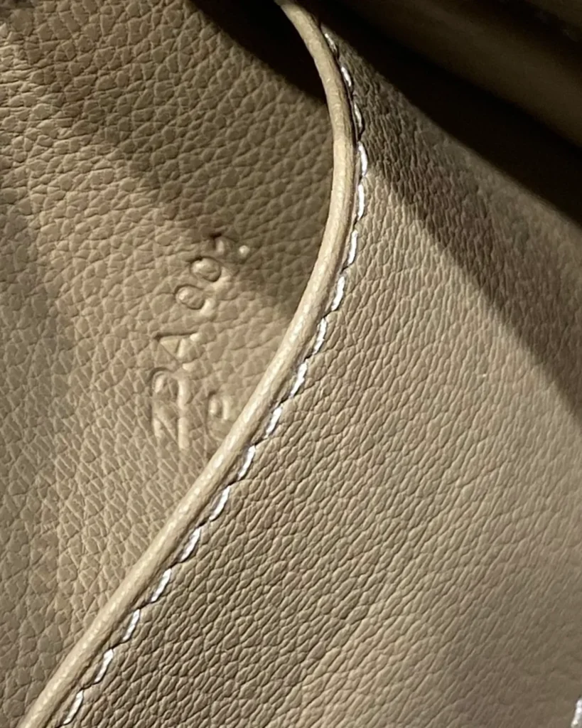 Lindy-Inspired Mini Taupe Crossbody Bag, embossed interior detail