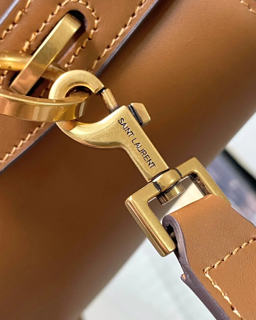 Tan Curved-Top Bucket Bag — strap detail view