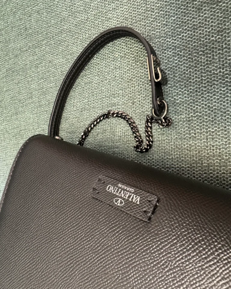 Dark Brown Embellished Emblem Top-Handle Bag — strap detail view