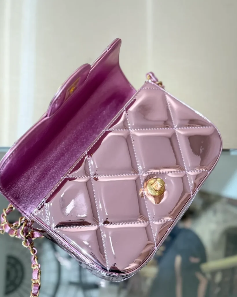 Metallic Pink Quilted Top-Handle Bag — raised flap view