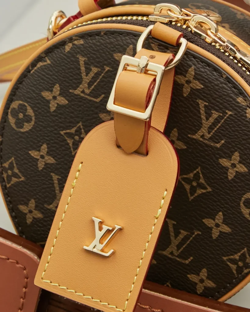 Brown Monogram Round Crossbody Bag — hanging tag view