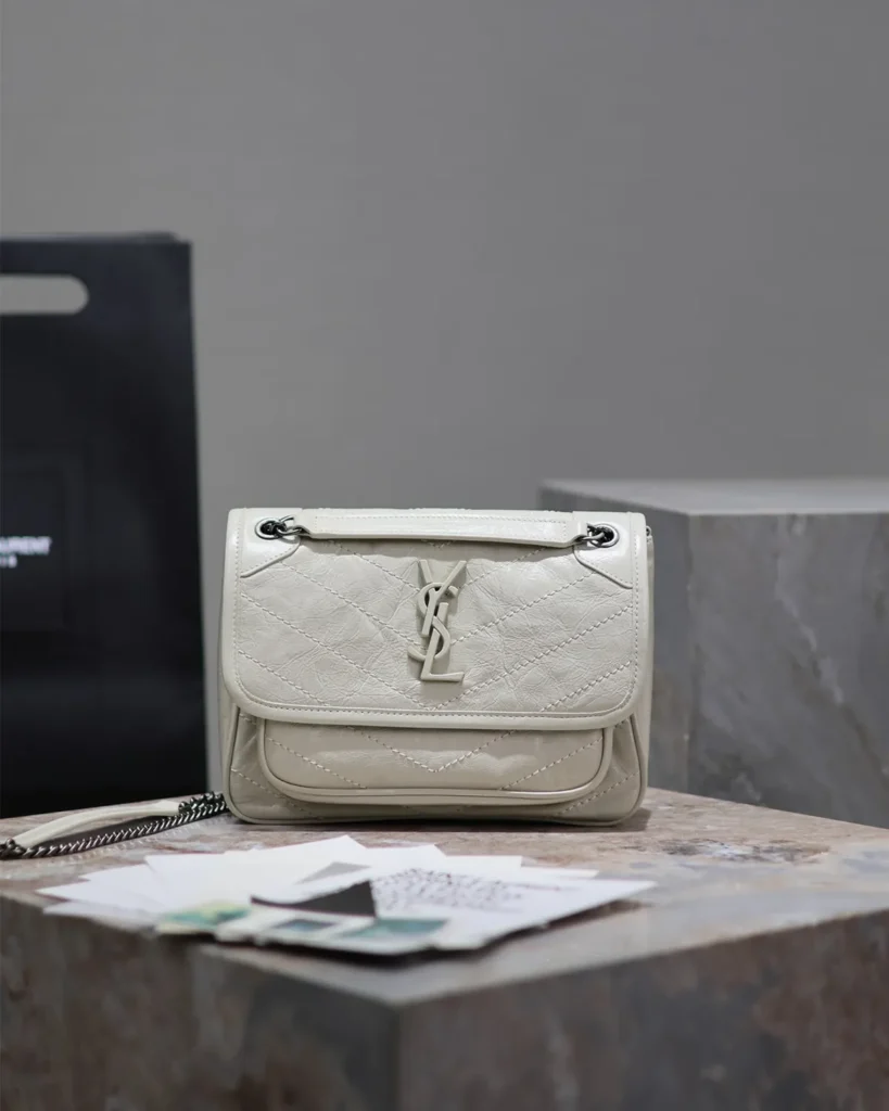 Ivory Crinkled Chevron Chain Bag — front view