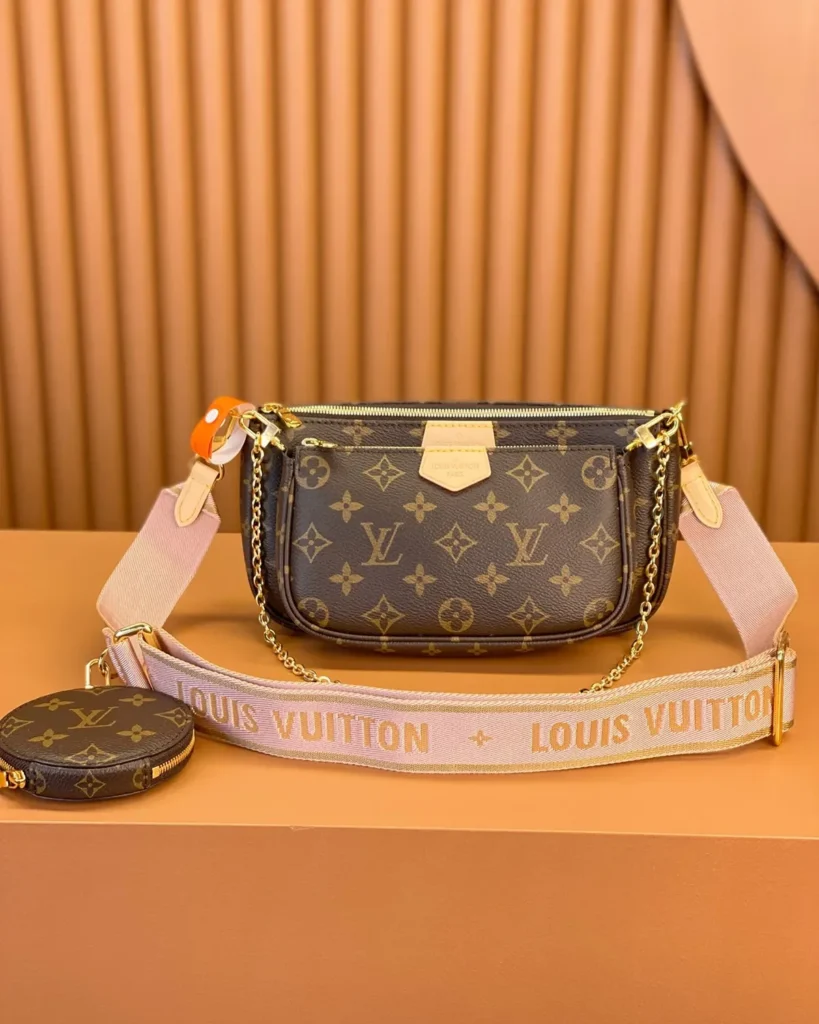 Brown Monogram Multi-Pouch Bag with Pink Strap — front view