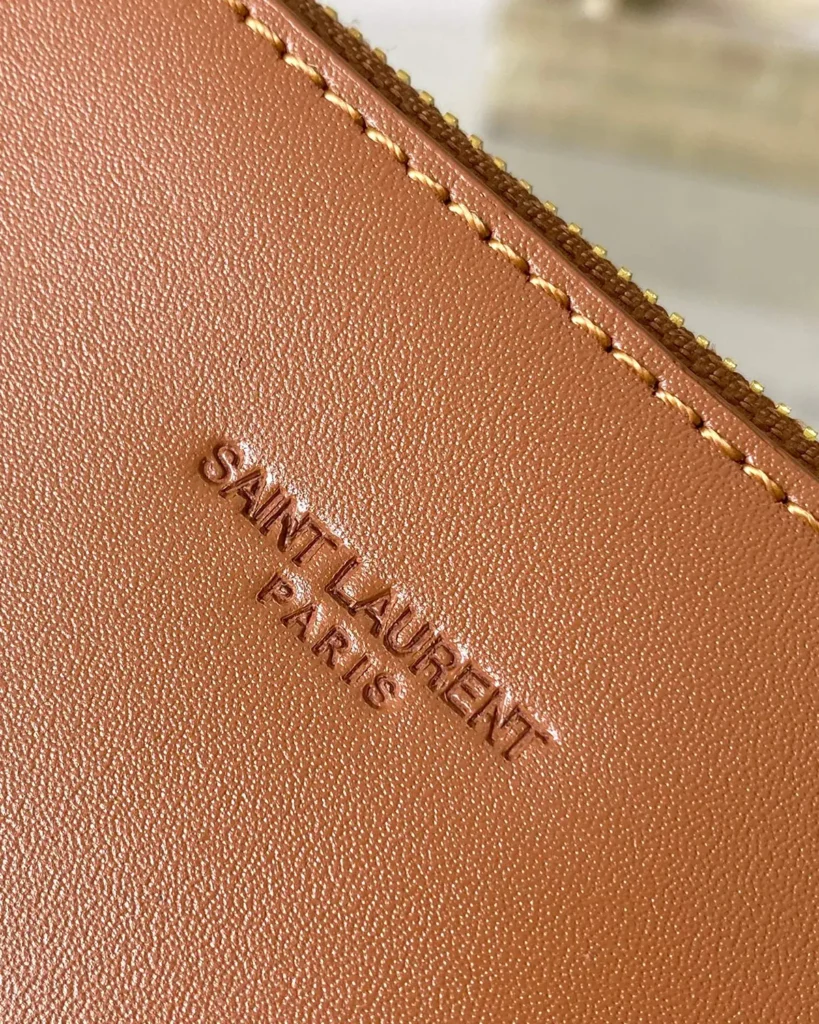 Straw-Tone Woven Bucket Bag with Tan Trim — trim detail view