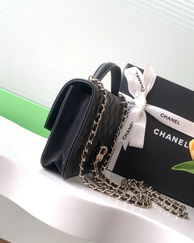 Black Quilted Top-Handle Chain Clutch — side view