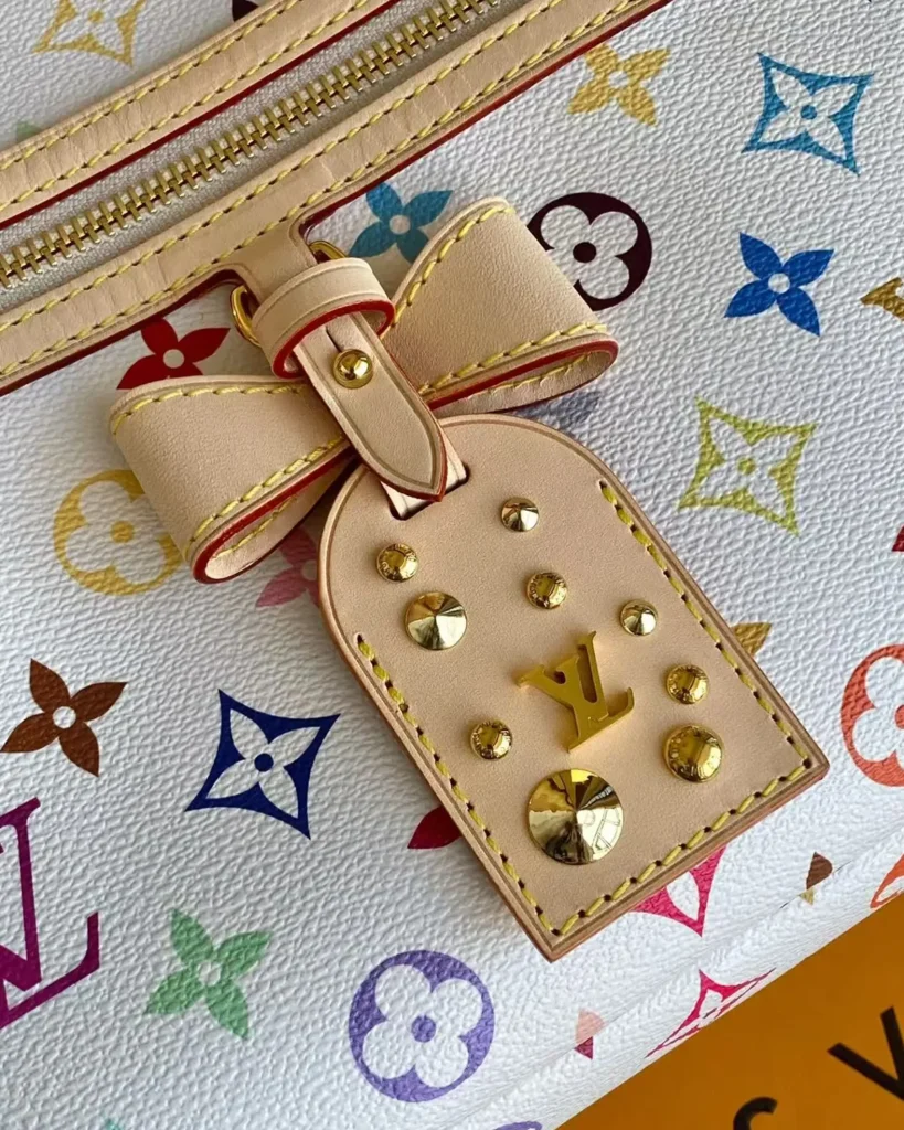 White Multicolor Monogram Bow Hobo Bag — bow detail view