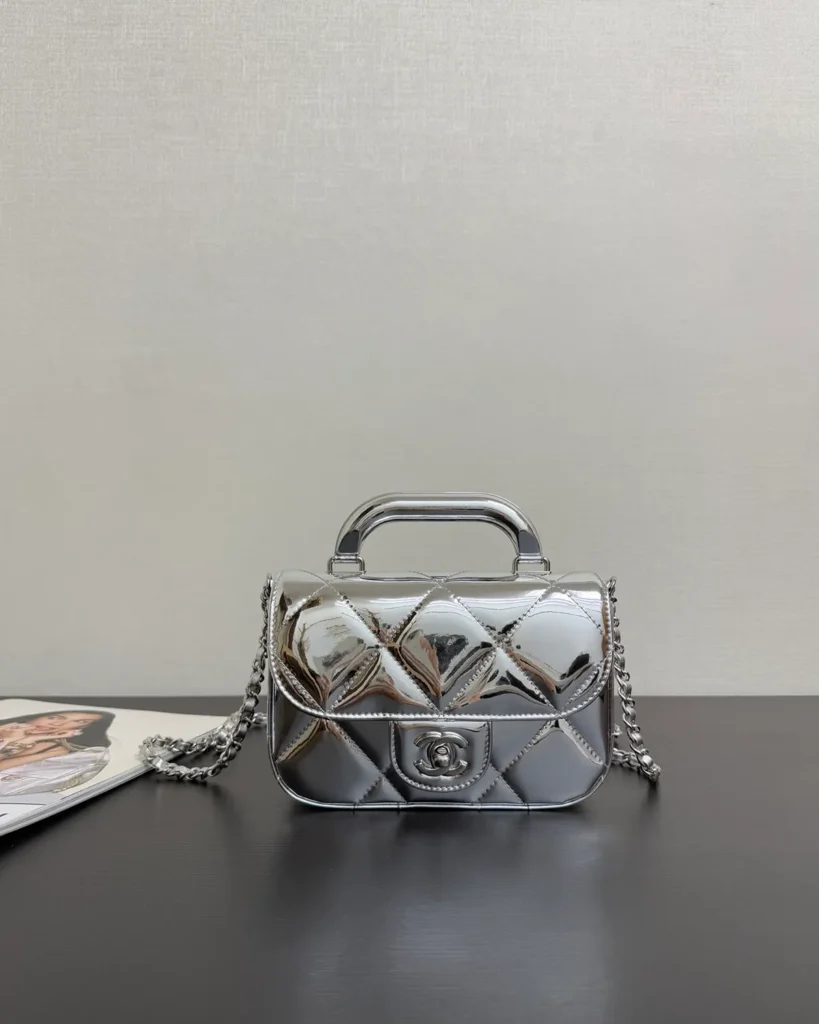 Metallic Silver Quilted Top-Handle Flap Bag — front view