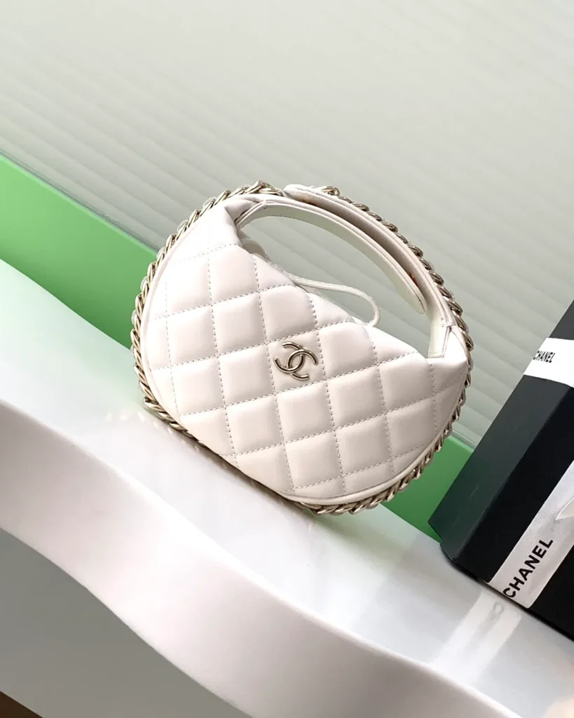 Ivory Quilted Round Chain-Edge Bag — front view