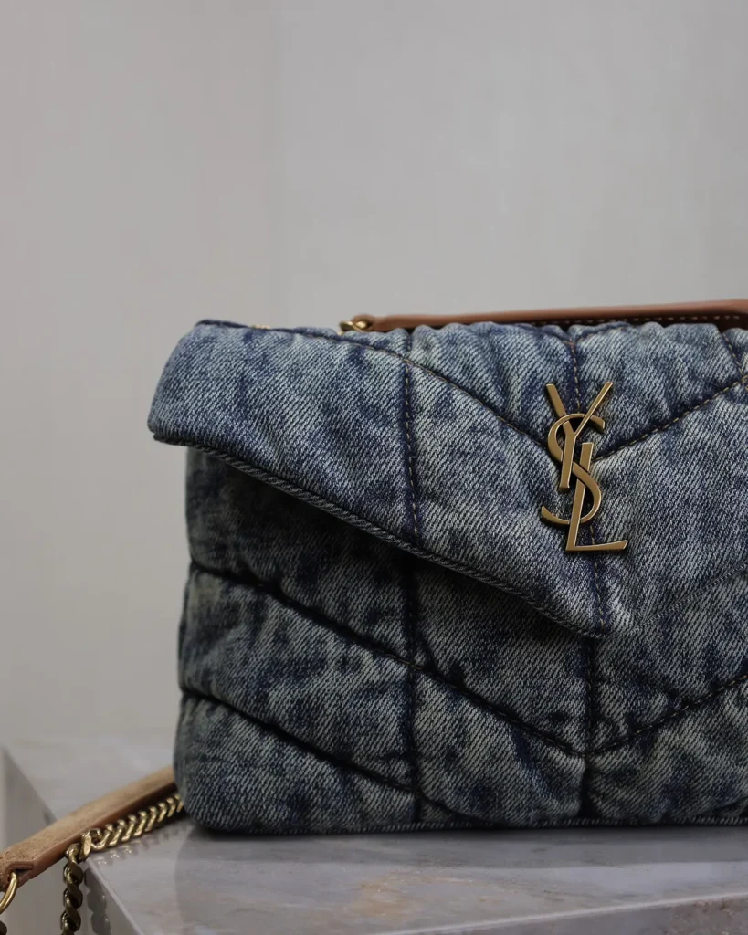 Washed-Blue Quilted Flap Bag — flap detail view