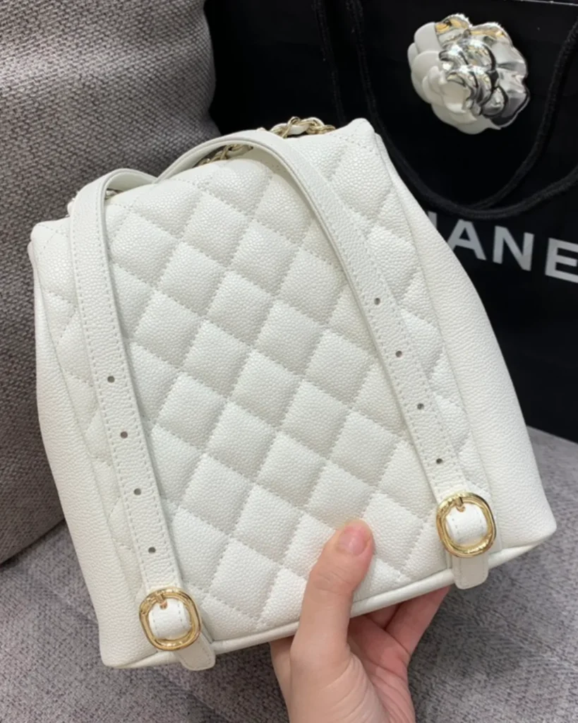 Ivory Quilted Twin-Pocket Backpack — rear view
