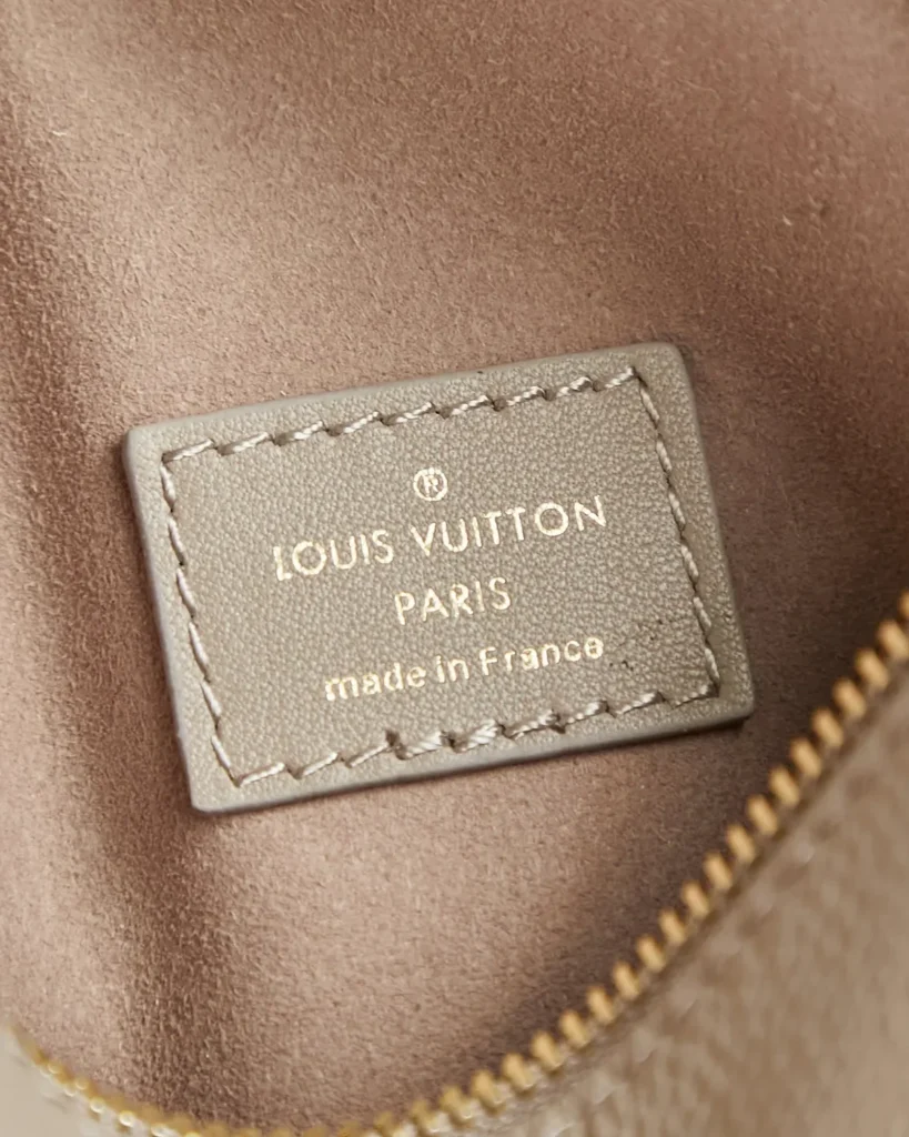 Taupe Corner-Plate Shoulder Bag — interior label view