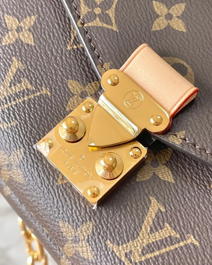 Brown Monogram East West Chain Satchel — clasp view