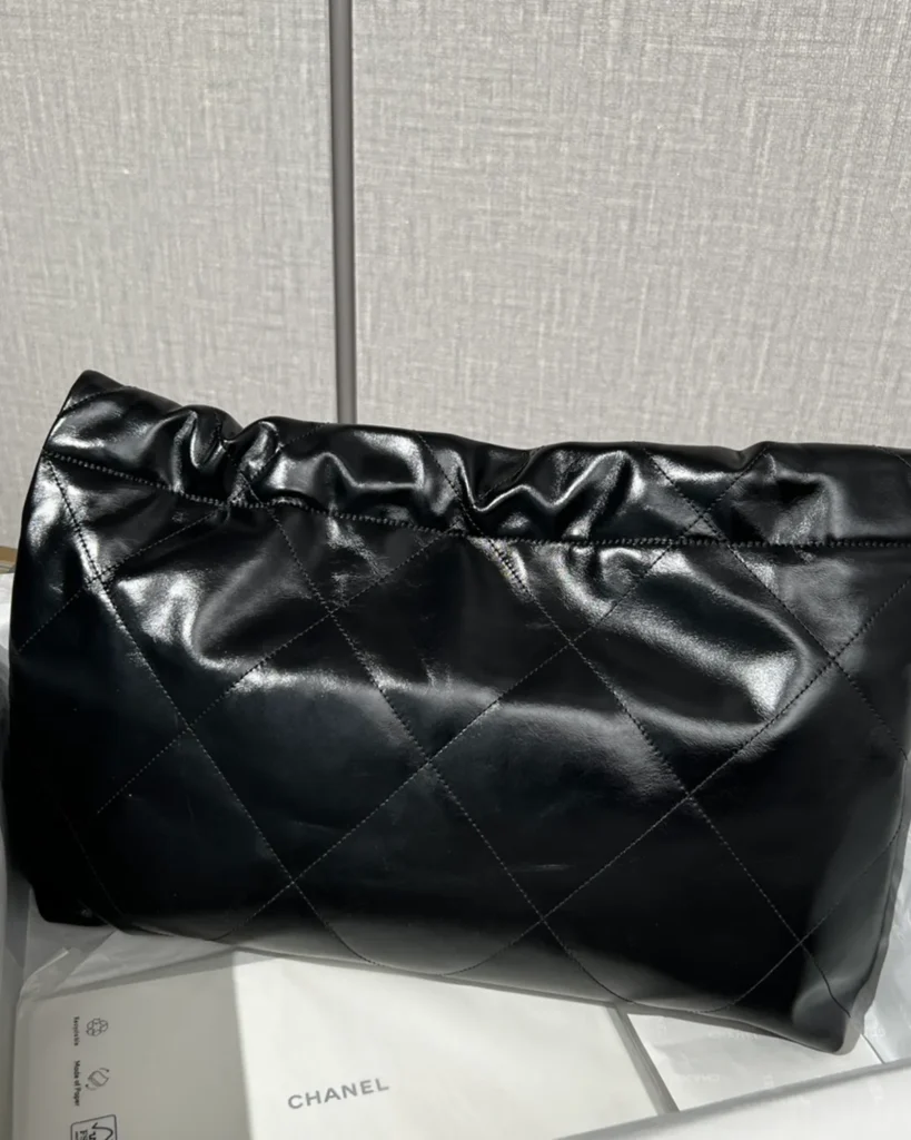 Glossy Black Quilted Chain Shopper — rear view